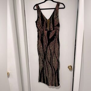 Showstopper! Deep neckline sequin dress. Never worn with tags, size XL